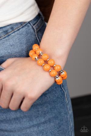 Paparazzi Accessories Bubble Blast Off - Orange Connected together by two dainty silver fittings, a bubbly collection of Saffron beads and shiny silver accents are threaded along two stretchy bands around the wrist for a bold pop of color. Jewelry