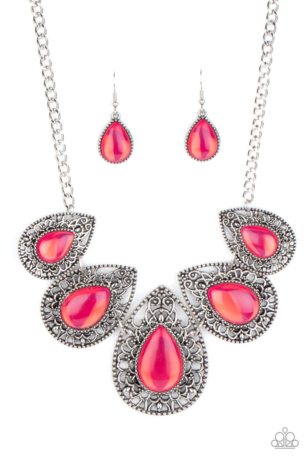 Paparazzi Accessories Opal Auras - Pink Featuring an opalescent shimmer, glassy pink teardrop beads are nestled inside shiny silver frames filled with vine-like antiqued filigree. Graduating in size, the whimsical frames delicately link below the collar f