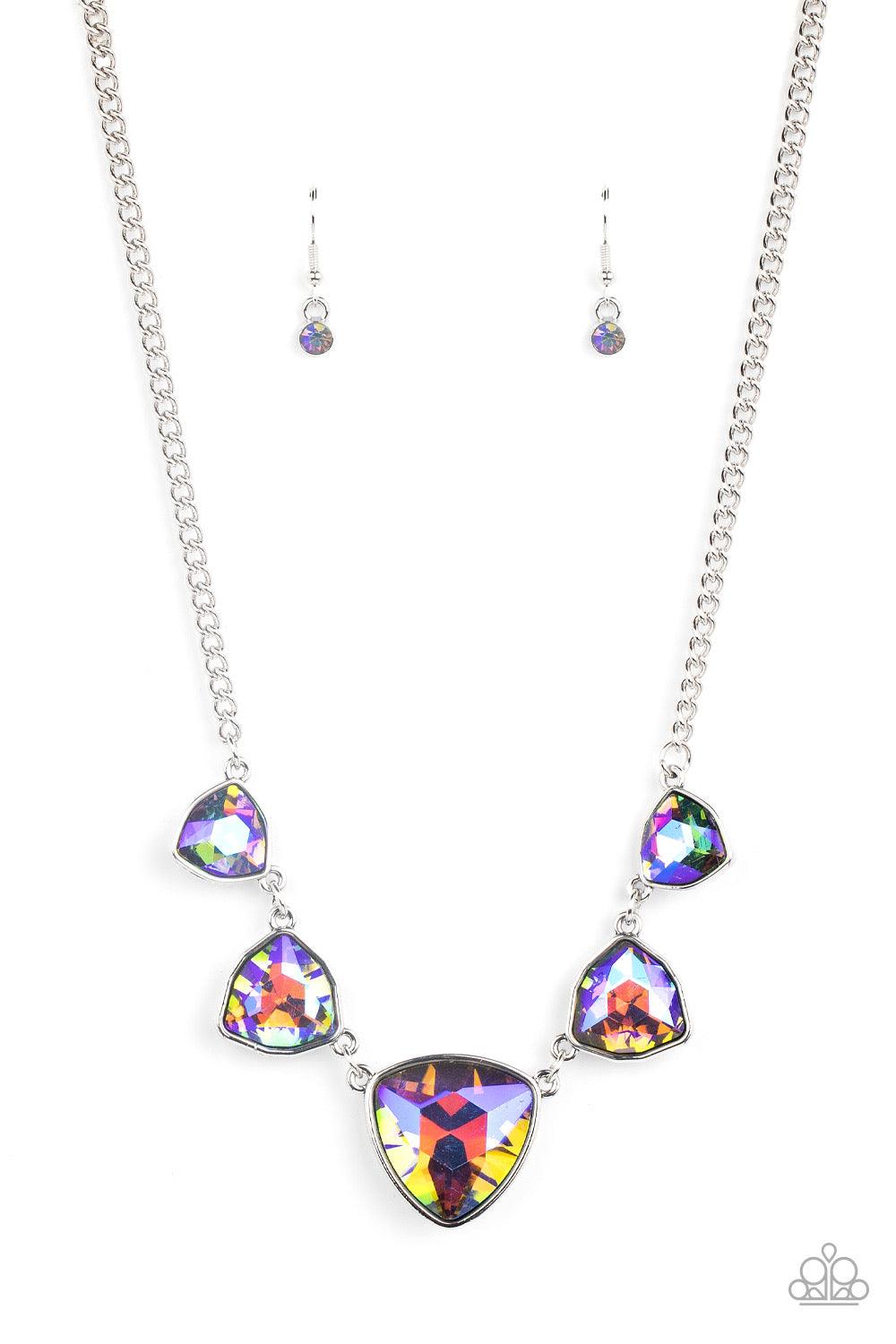 Paparazzi Accessories Cosmic Constellations - Multi Encased in sleek silver fittings, an oversized collection of UV geometric gems gradually increase in size as they link below the collar for a stellar statement. Features an adjustable clasp closure. Due