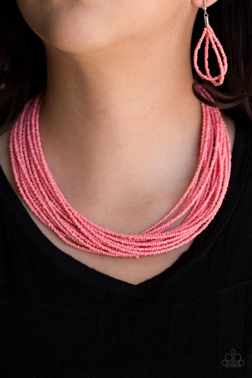 Paparazzi Accessories Wide Open Spaces - Orange Infused with two large silver fittings, refreshing coral seed beads are threaded along countless strands, creating dramatic layers below the collar for a seasonal look. Features an adjustable clasp closure.