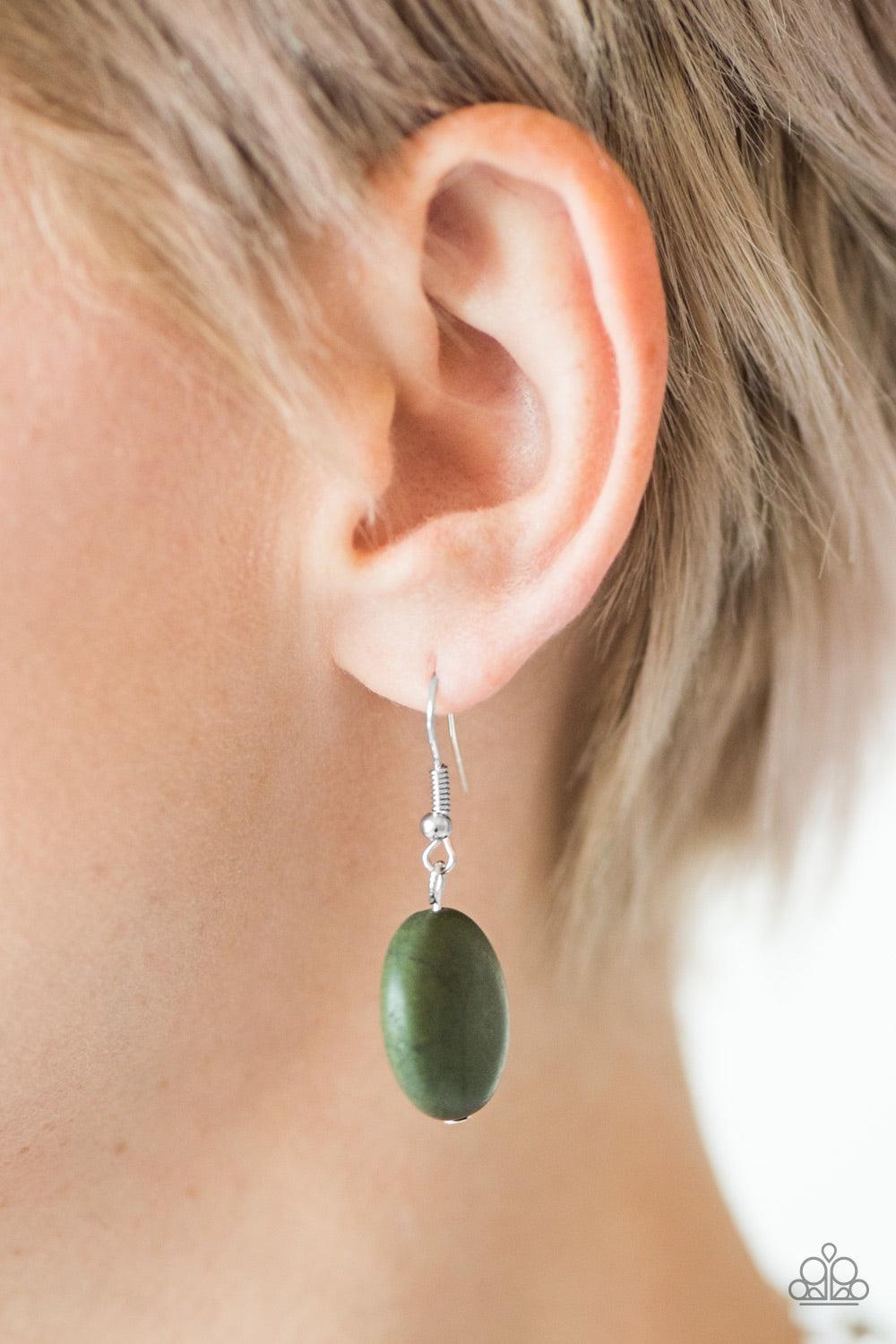 Paparazzi Accessories Bedrock Betty - Green Flat green stones link below the collar in an earthy fashion. Dainty silver beads are sprinkled between the earthy stone accents, adding hints of shimmer to the bold artisanal palette. Features an adjustable cla