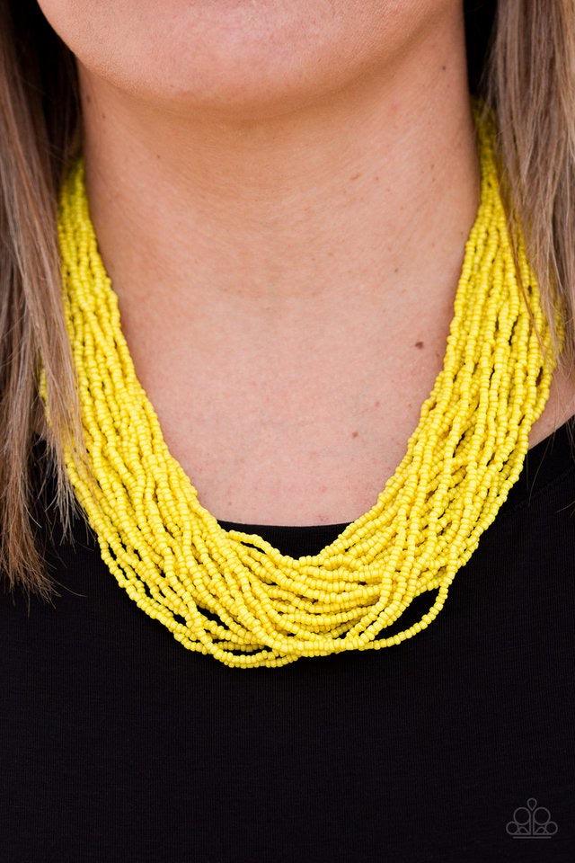 Paparazzi Accessories The Show Must CONGO On - Yellow Infused with two bold silver fittings, countless strands of yellow seed beads drape below the collar for a seasonal look. Features an adjustable clasp closure. Jewelry