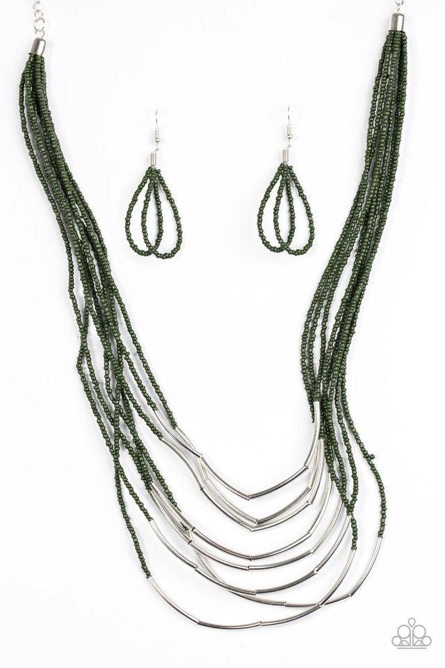 Paparazzi Accessories Living the GLEAM - Green Infused with two large silver fittings, shiny green seed beads are threaded along countless strands, creating dramatic layers below the collar. Shimmery silver accents slide along the centers of the strands,