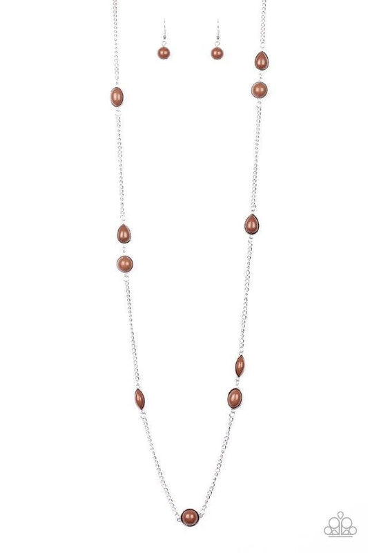 Paparazzi Accessories Pacific Piers - Brown Featuring round and teardrop shapes, brown beading trickles along an elongated silver chain for a seasonal look. Features an adjustable clasp closure. Sold as one individual necklace. Includes one pair of matchi