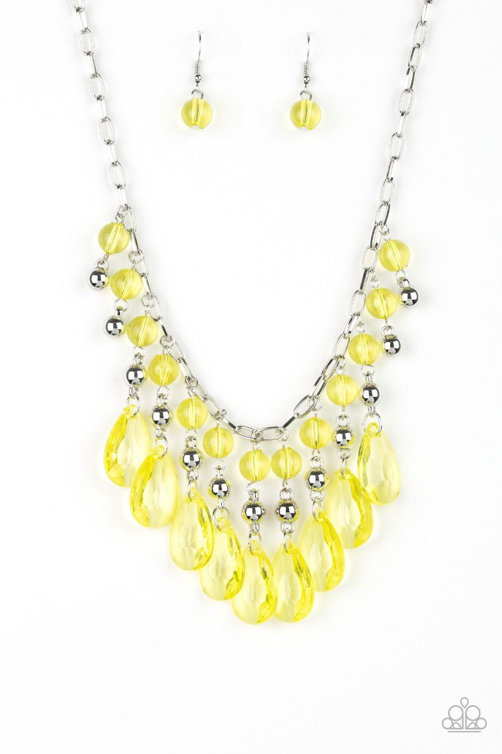 Paparazzi Accessories Beauty School Drop Out - Yellow Faceted crystal-like teardrops in a gorgeous yellow hue dance along the neckline with shiny silver beads and smaller yellow crystal-like beads creating a dramatic flair. Features an adjustable clasp cl