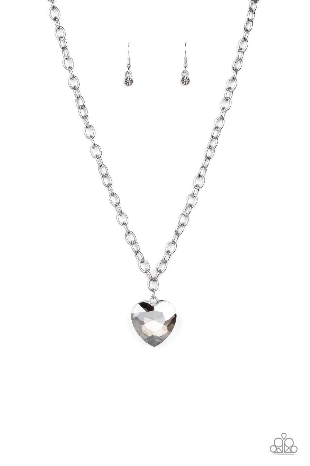 Paparazzi Accessories Flirtatiously Flashy - Silver Set atop a sleek silver fitting, a smoky heart-shaped gem swings from the bottom of a classic silver chain below the collar for a whimsical look. Features an adjustable clasp closure. Jewelry
