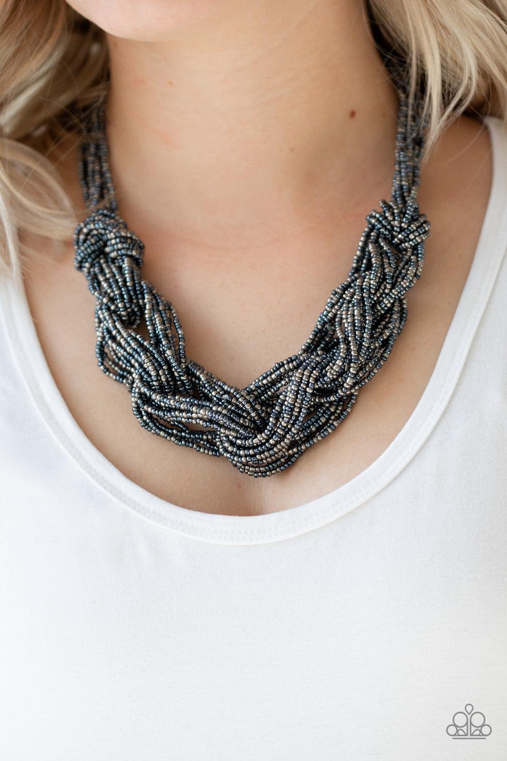 Paparazzi Accessories City Walk - Blue Brushed in a flashy metallic finish, countless strands of blue and gunmetal seed beads weave into a bulky square braid below the collar for a glamorous look. Features an adjustable clasp closure. Sold as one individu