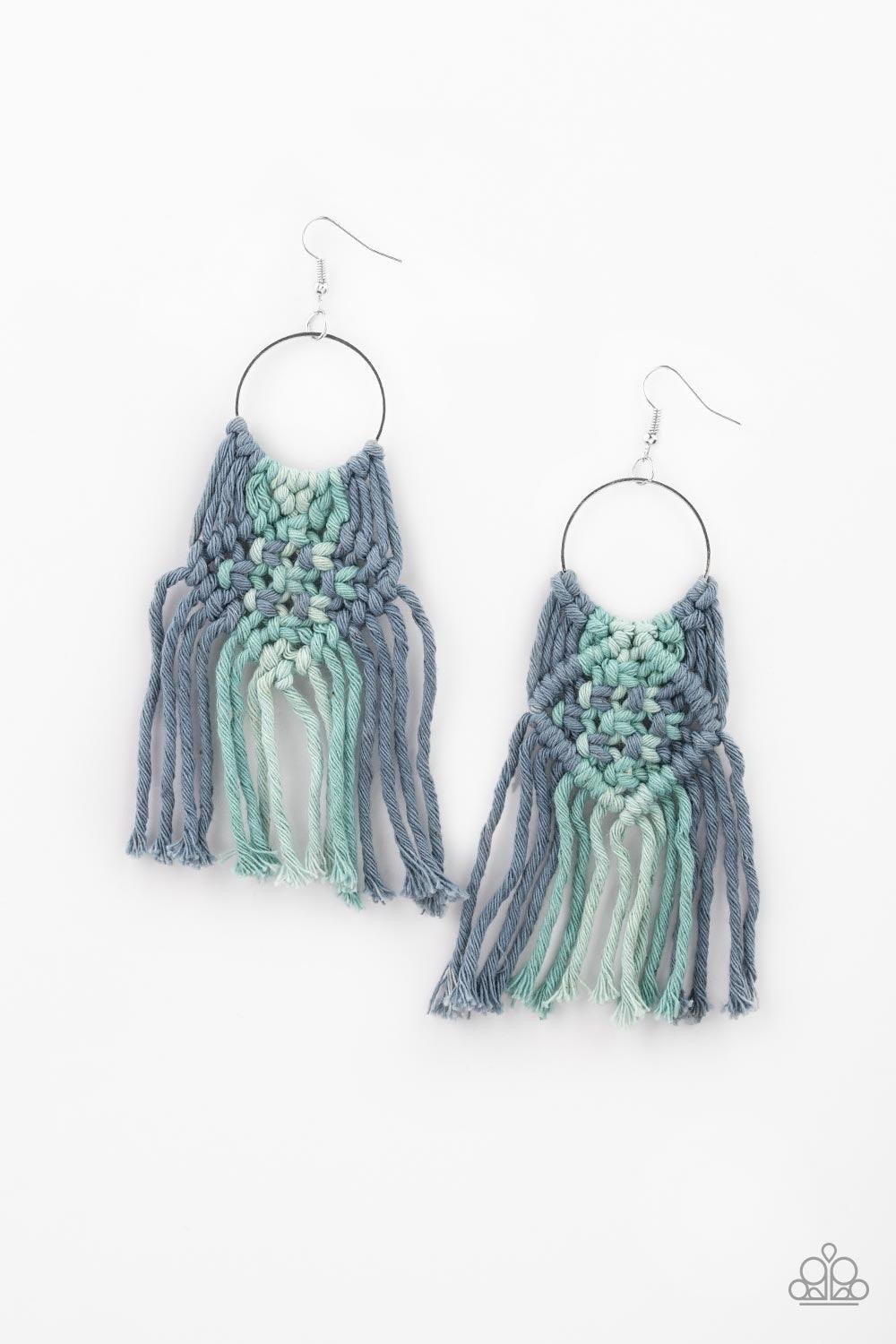 Paparazzi Accessories Macrame Rainbow - Blue An ombre of mixed blue cording knots around the bottom of a dainty silver hoop, weaving into a colorful macramé fringe. Earring attaches to a standard fishhook fitting. Jewelry