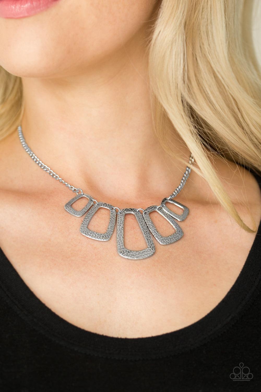 Paparazzi Accessories Nice FRAMEWORK - Silver Radiating in hammered textures, rectangular frames swing from a shimmery silver frame below the collar for an edgy geometric look. Features an adjustable clasp closure. Sold as one individual necklace. Include