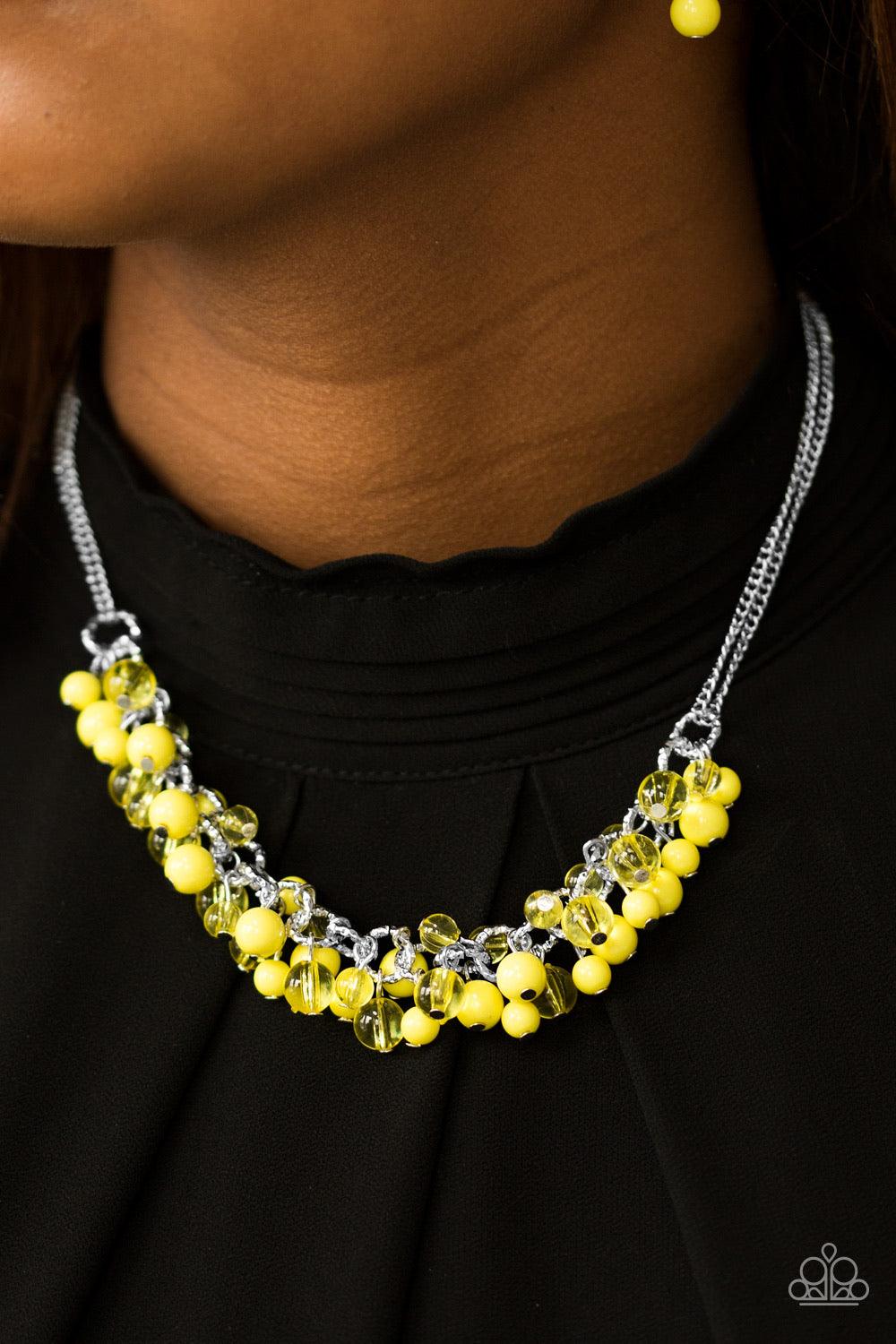Paparazzi Accessories Boulevard Beauty - Yellow Featuring glassy and polished finishes, sunny yellow beads cascade from the bottom of textured silver links, creating a gorgeous clustered fringe below the collar. Features an adjustable clasp closure. Jewel