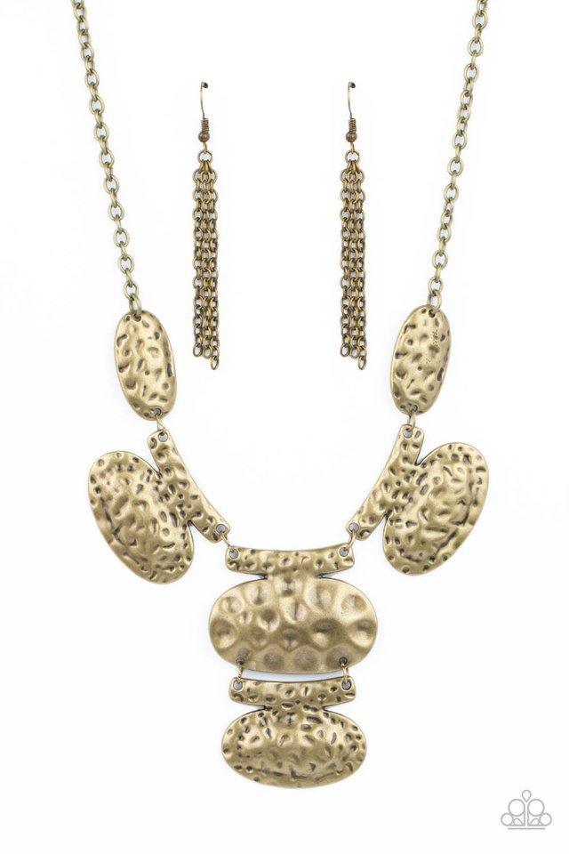 Paparazzi Accessories Gallery Relic - Brass Attached to bar-like plates, mismatched brass oval plates link below the collar, creating an intense industrial statement below the collar. Features an adjustable clasp closure. Sold as one individual necklace.
