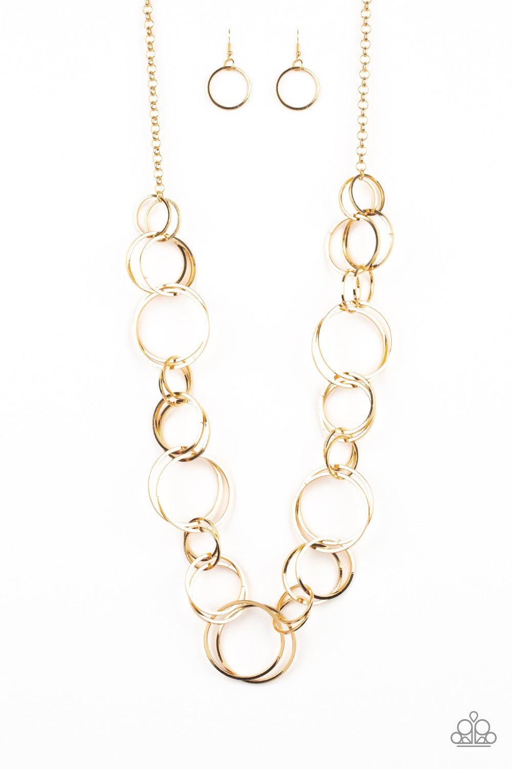 Paparazzi Accessories Natural Born RINGLEADER - Gold Pairs of dramatically oversized gold hoops connect across the chest, creating an elegantly elongated statement piece for a fearless look. Features an adjustable clasp closure. Jewelry
