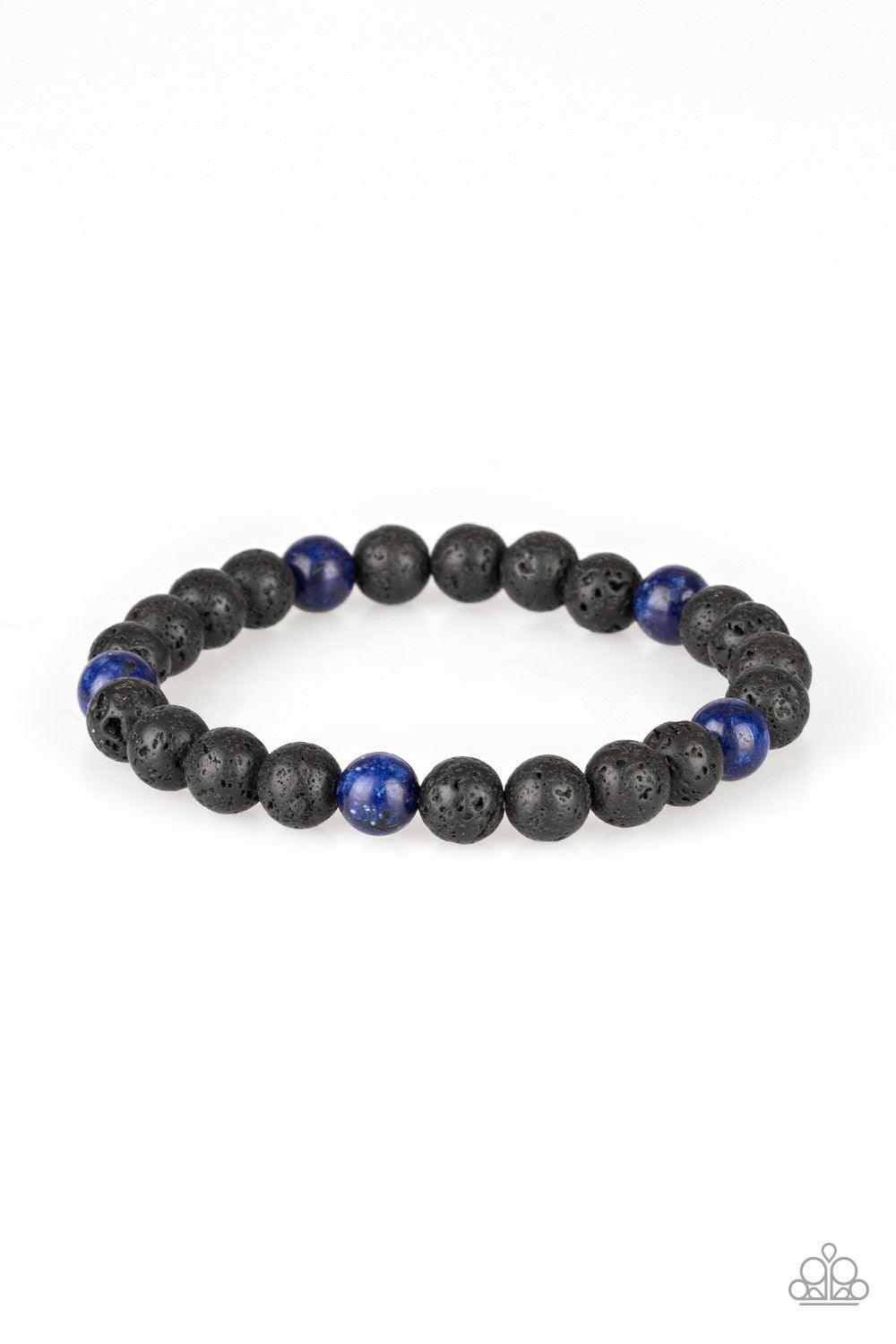 Paparazzi Accessories Enlivened - Blue An earthy collection of black lava stones and glassy blue stones are threaded along a stretchy band around the wrist for a seasonal look. Jewelry