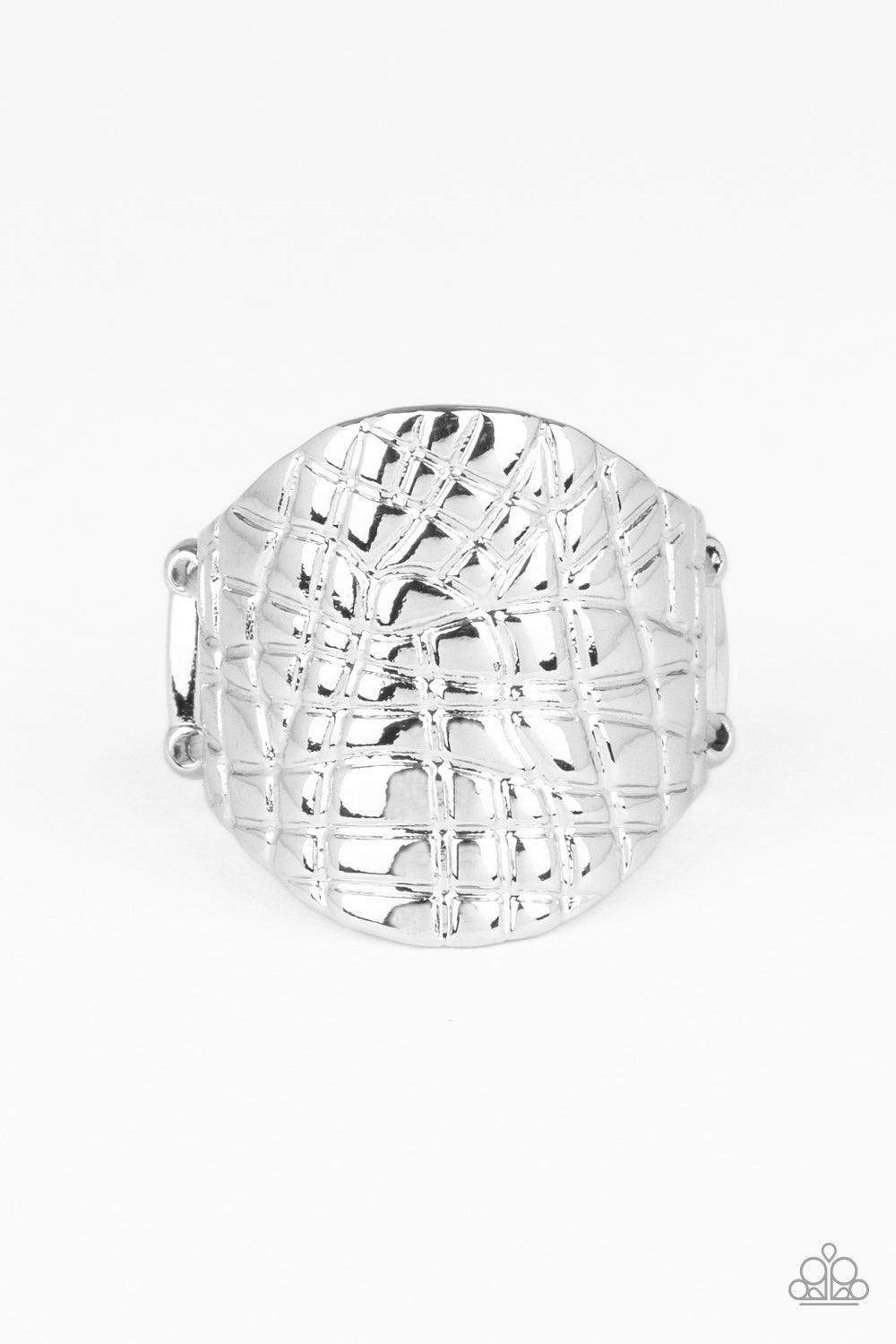 Paparazzi Accessories Metal Jungle - Silver Etched in an abstract linear pattern, a thick silver frame curls around the finger for an edgy metallic look. Features a stretchy band for a flexible fit. Jewelry