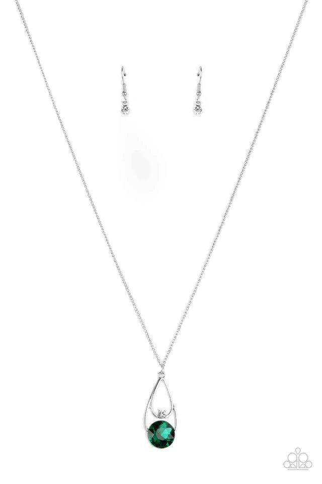 Paparazzi Accessories Gala Gleam - Green Two silver teardrops delicately overlap in a solitaire pendant at the bottom of a shiny silver chain. A dainty white rhinestone dots the bottom of the highest teardrop, while an oversized green gem adorns the lower