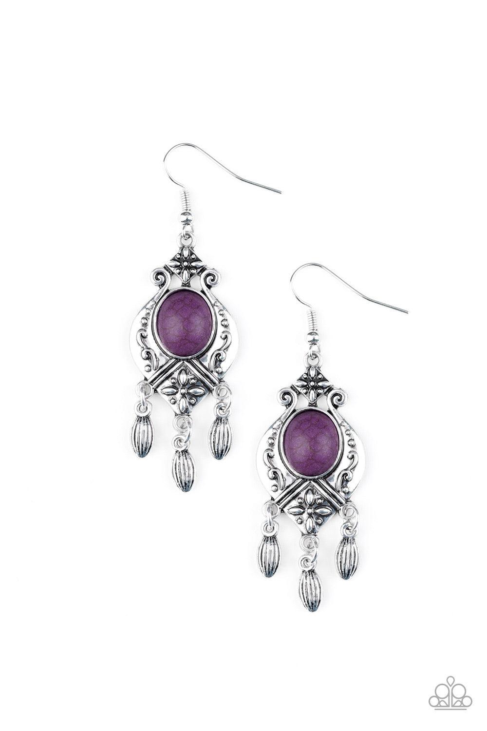 Paparazzi Accessories Enchantingly Environmentalist - Purple A vivacious purple stone is pressed into a silver frame radiating with floral details. Dainty silver beads swing from the bottom of the frame, adding a wanderlust finish to the seasonal palette.