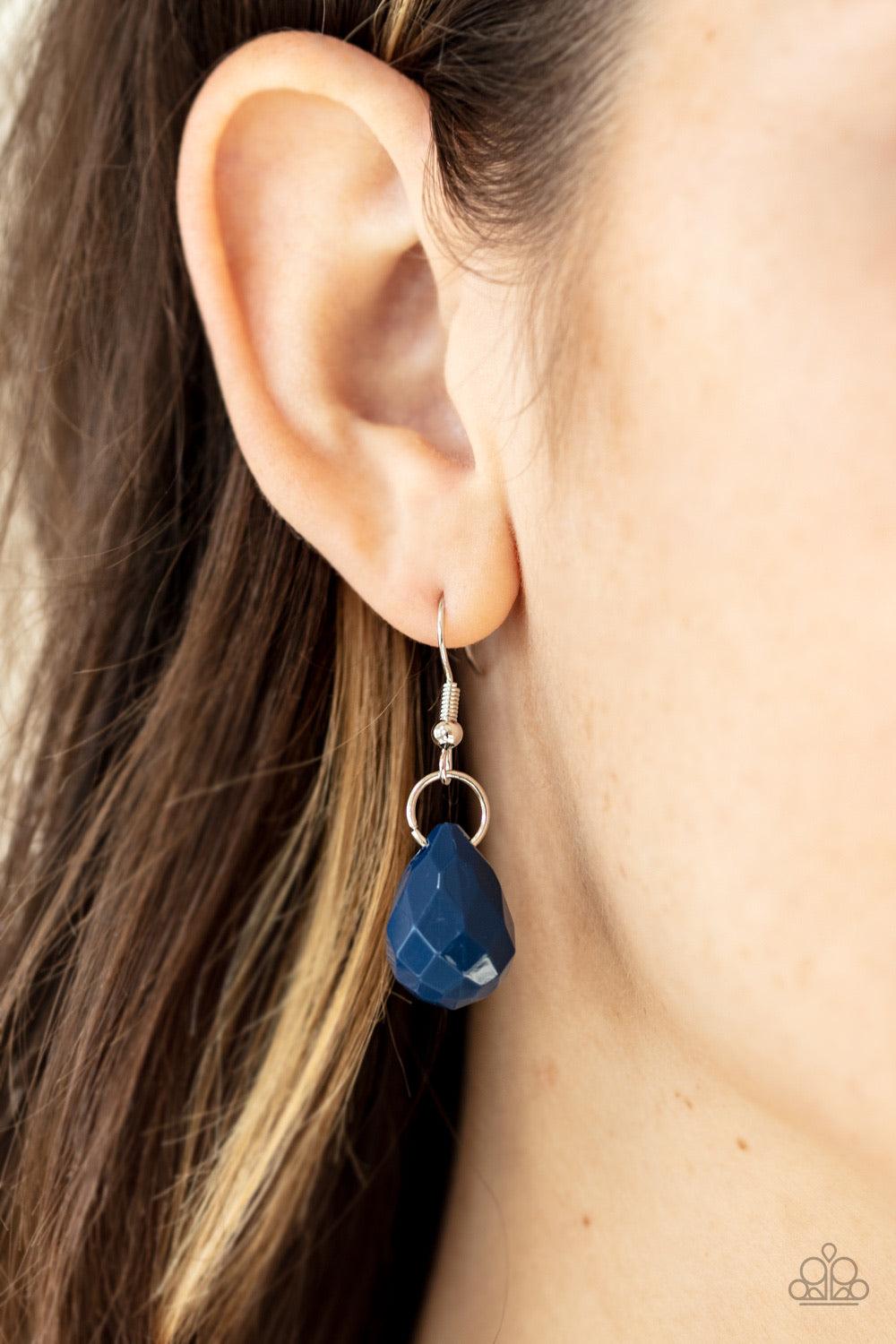 Paparazzi Accessories Serenely Scattered - Blue Strands of faceted blue teardrops cascade from the bottom of a shimmery silver chain, creating a vivacious scattered fringe below the collar. Features an adjustable clasp closure. Jewelry