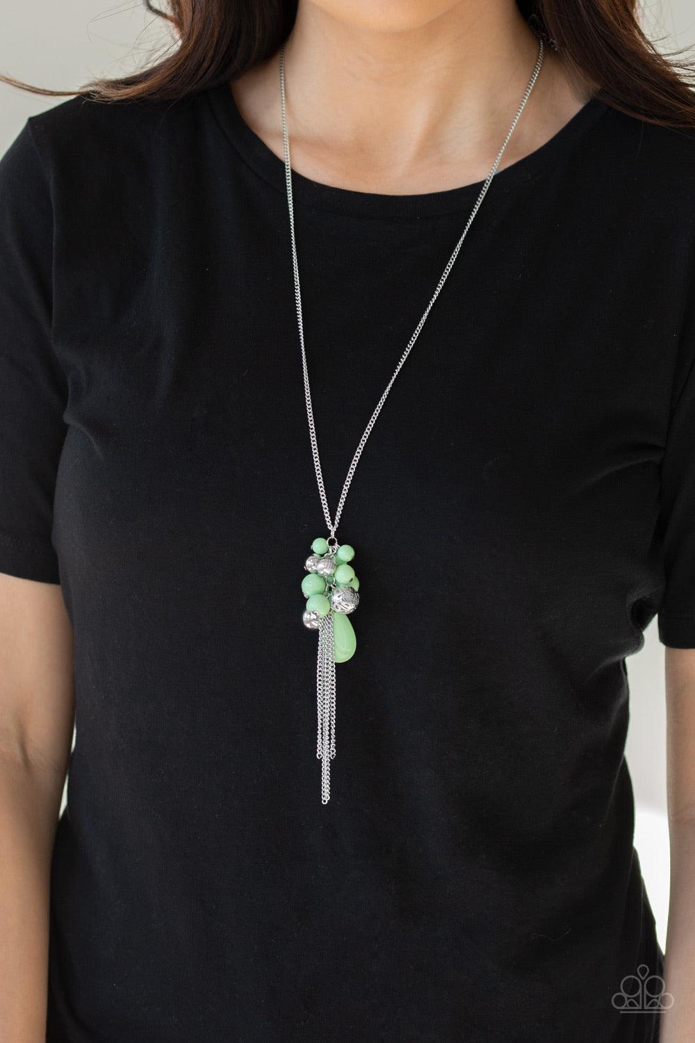 Paparazzi Accessories It’s A Celebration - Green A collection of minty green and silver beads create a colorful cluster at the bottom of a shimmery silver chain. Features an adjustable clasp closure. Sold as one individual necklace. Includes one pair of m