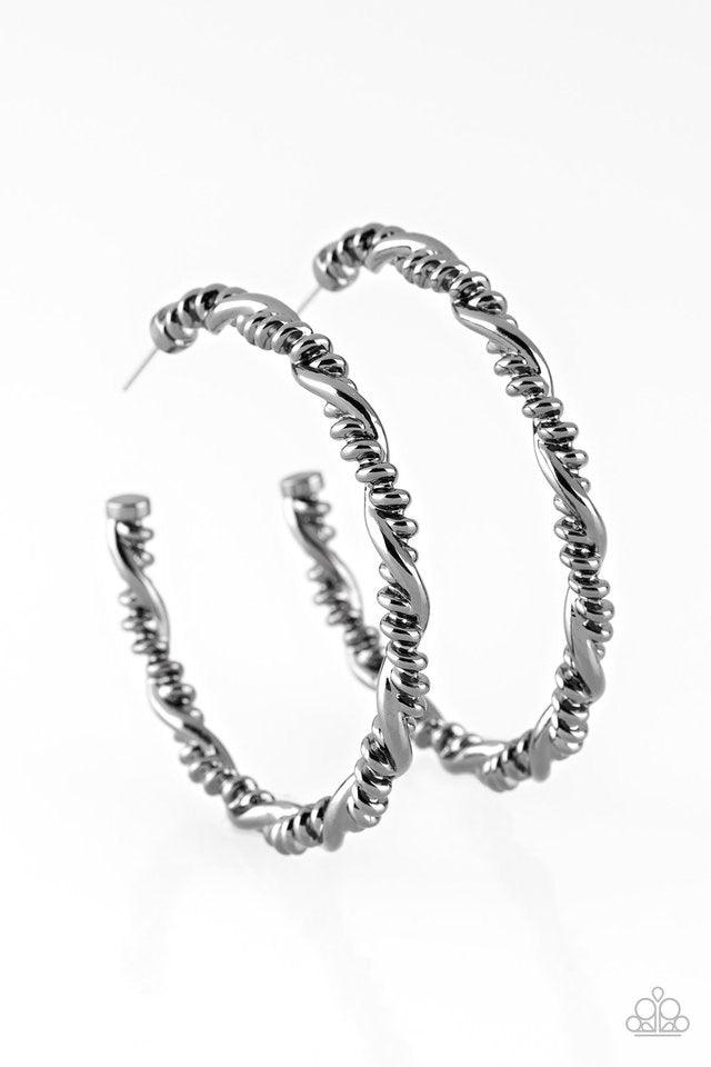 Paparazzi Accessories Street Mod - Black Glistening gunmetal bars wrap into an edgy twisted hoop for a casual look. Earring attaches to a standard post fitting. Hoop measures 2" in diameter. Jewelry