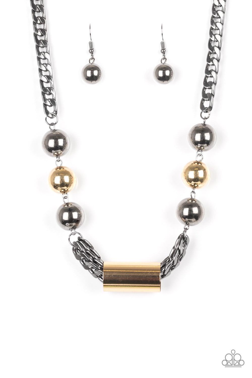 Paparazzi Accessories All About Attitude - Black Heavy gunmetal chains give way to sections of bold gold and gunmetal beads. A glistening gold accent slides along joined rows of heavy gunmetal chains, creating a spunky industrial centerpiece below the col