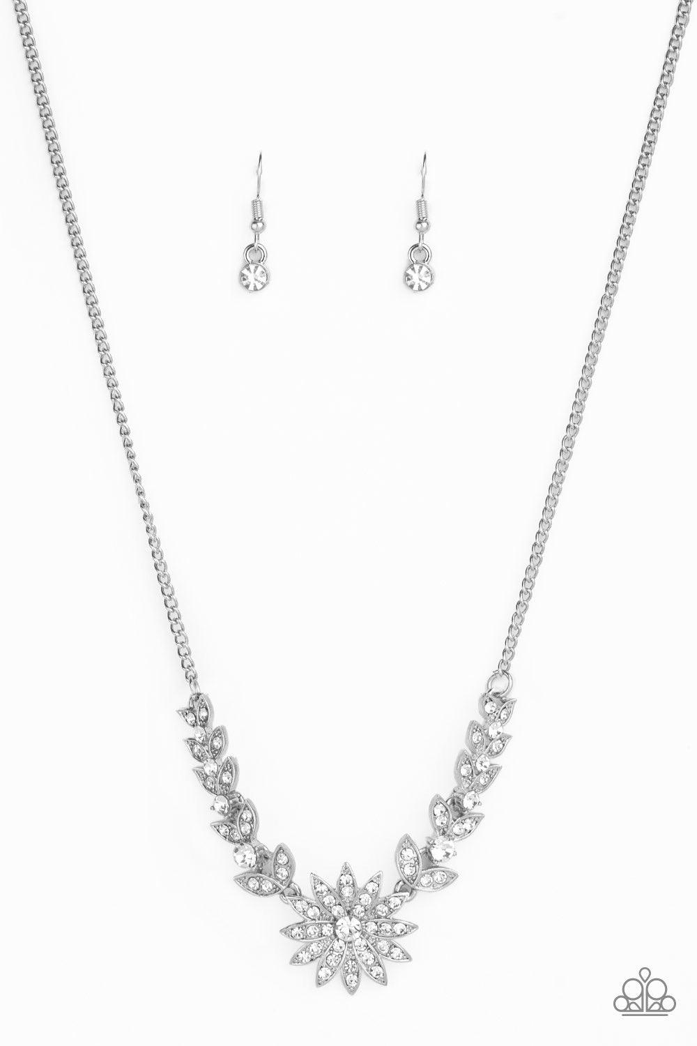 Paparazzi Accessories Garden Glamour - White Encrusted in glassy white rhinestones, glittery leafy frames give way to a blooming silver frame encrusted in dazzling white rhinestones below the collar for a sparkling seasonal finish. Features an adjustable