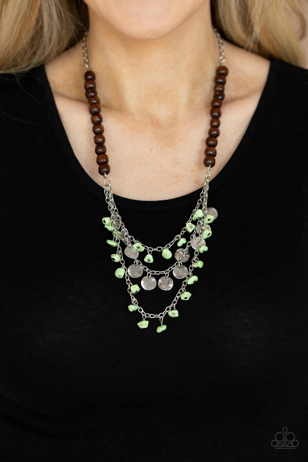 Paparazzi Accessories Plains Paradise - Green Adorned with green pebbles and hammered silver discs, three silver chains layer from strands of brown wooden beads, creating an earthy fringe below the collar. Features an adjustable clasp closure. Sold as one