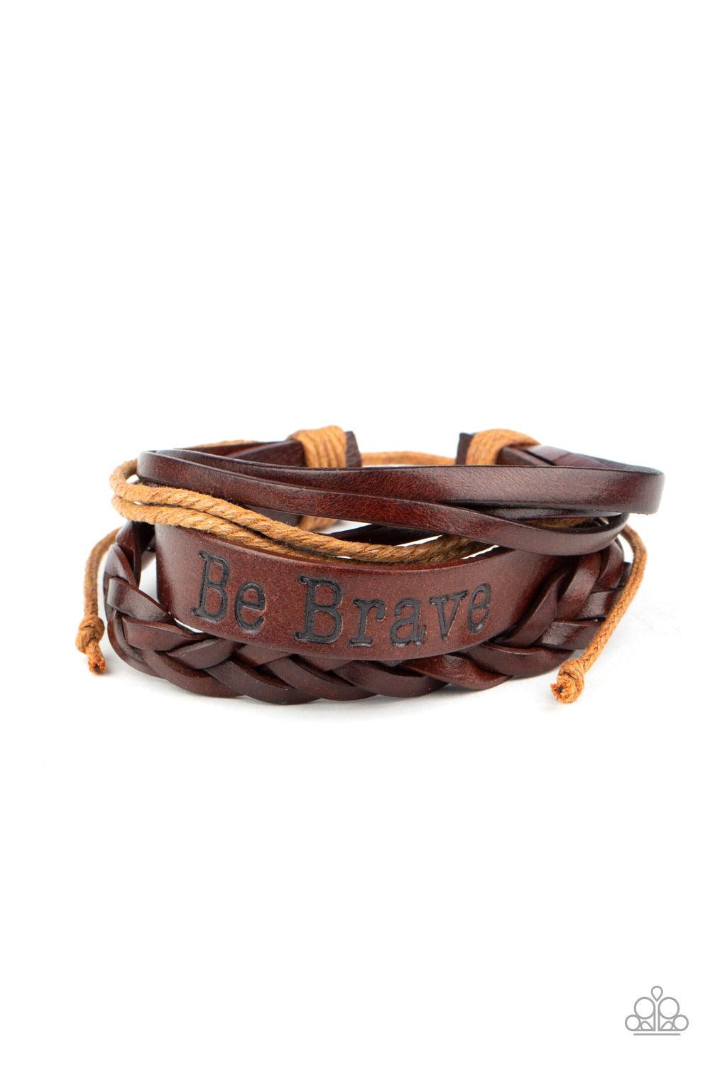 Paparazzi Accessories Brave Soul - Brown Mismatched strands of brown twine and leather cords join a thick brown leather band stamped in the phrase, "Be Brave," around the wrist for a rustically layered look. Features an adjustable sliding knot closure. So