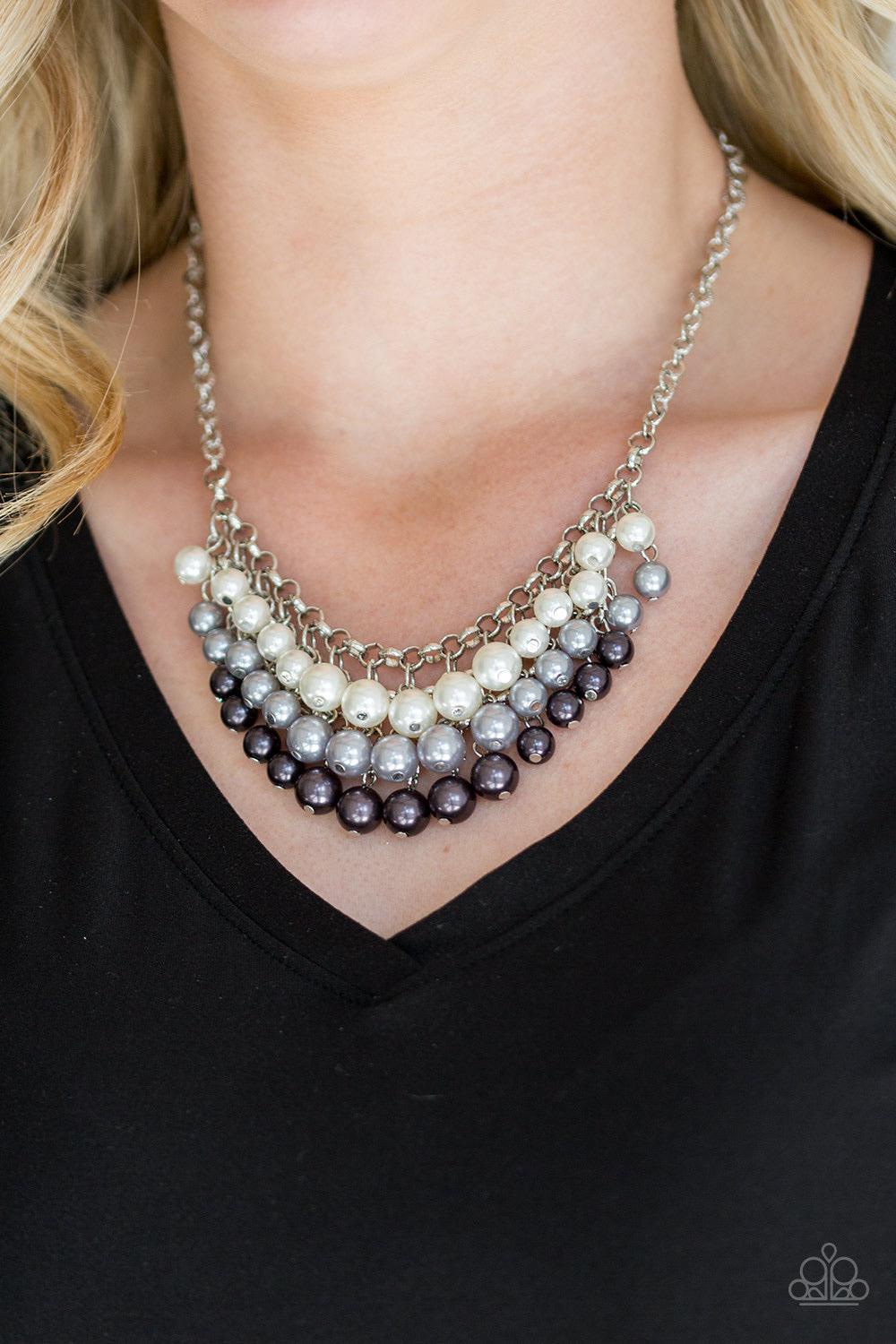 Paparazzi Accessories Run For The HEELS - Multi Rows of white, silver, and gunmetal pearls cascade below the collar, creating a glamorous fringe. Features an adjustable clasp closure. Sold as one individual necklace. Includes one pair of matching earrings