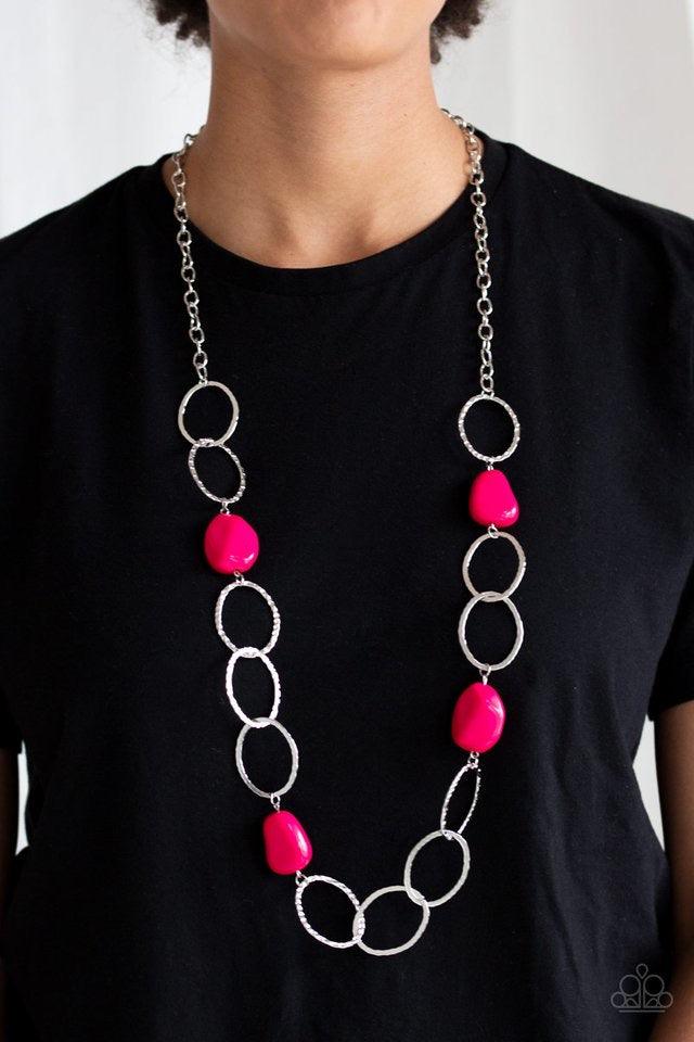 Paparazzi Accessories Modern Day Malibu - Pink Featuring a faux rock finish, faceted pink beads join hammered silver hoops across the chest for a seasonal look. Features an adjustable clasp closure. Sold as one individual necklace. Includes one pair of ma