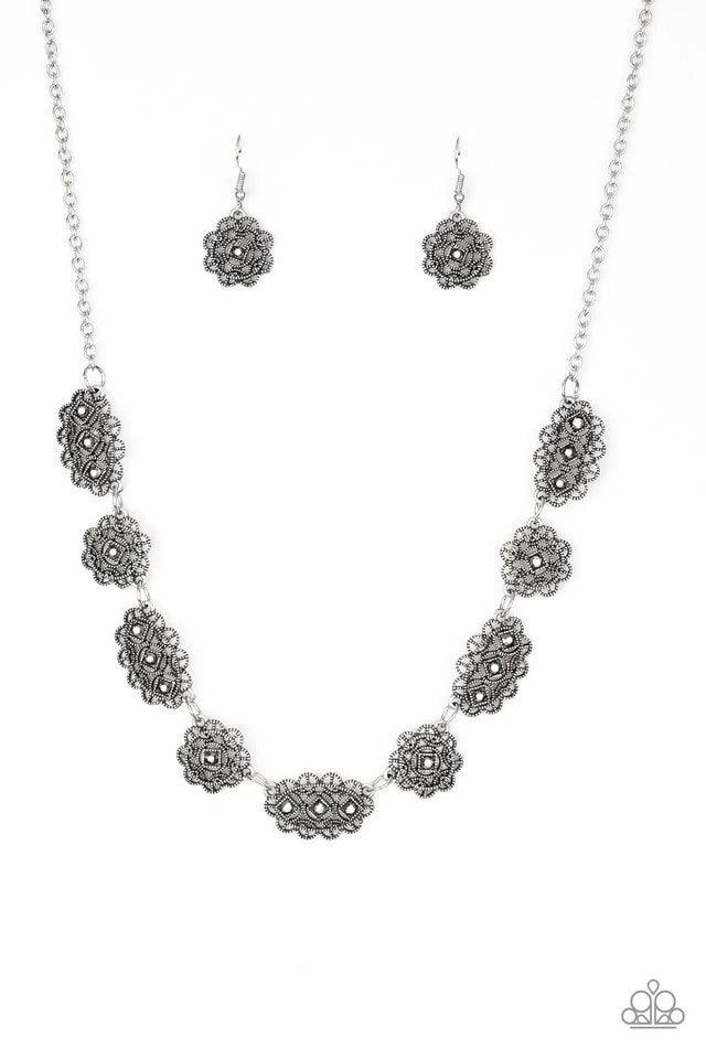 Paparazzi Accessories Vintage Vogue- ~Silver Encrusted in glittery hematite rhinestones, ornate filigree filled silver frames link below the collar for a vintage inspired style. Features an adjustable clasp closure. Jewelry