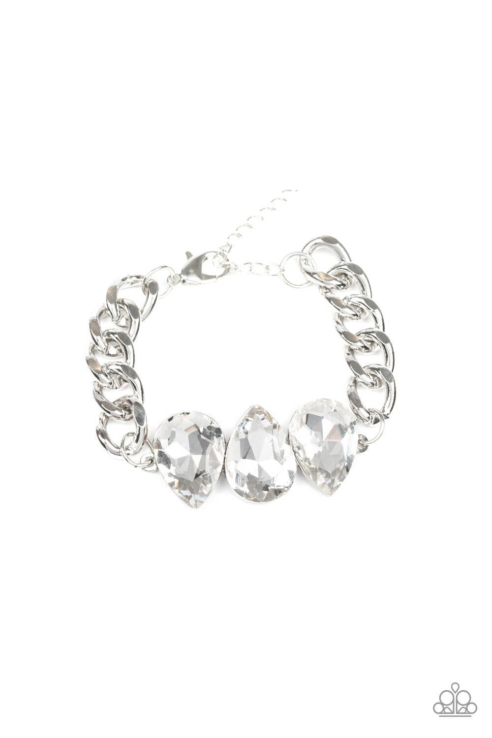 Paparazzi Accessories Bring Your Own Bling - White Three oversized white teardrop gems join at the center of a dramatic silver chain, creating a jaw-dropping display across the wrist. Features an adjustable clasp closure. Jewelry