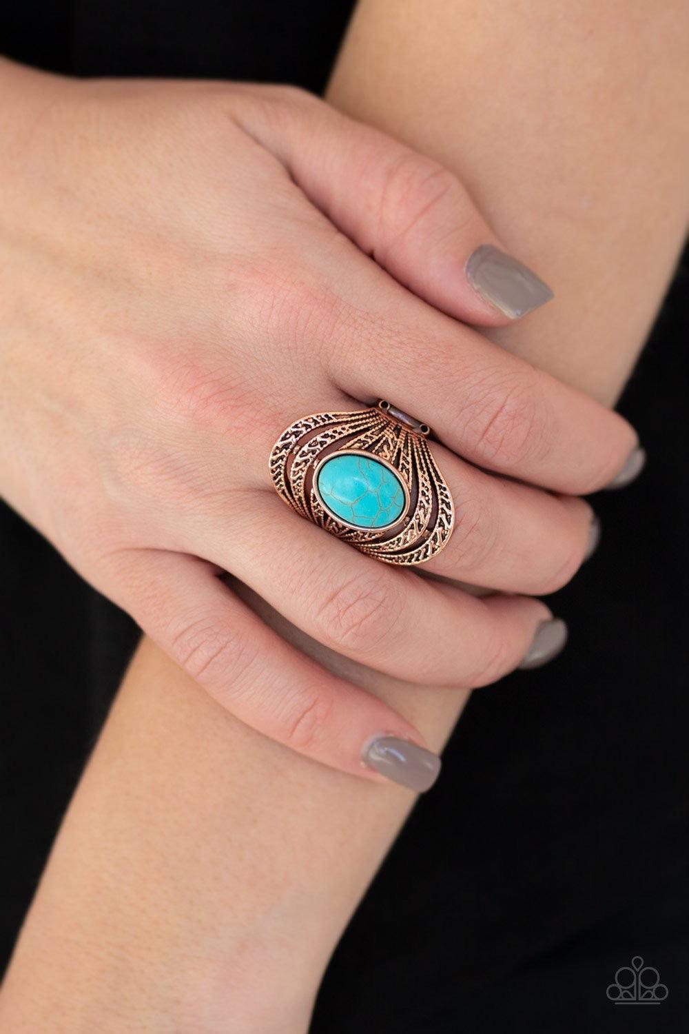 Paparazzi Accessories Royal Roamer - Copper A refreshing turquoise stone is pressed into the center of layered copper bands radiating with tribal inspired textures for a seasonal look. Features a stretchy band for a... Jewelry