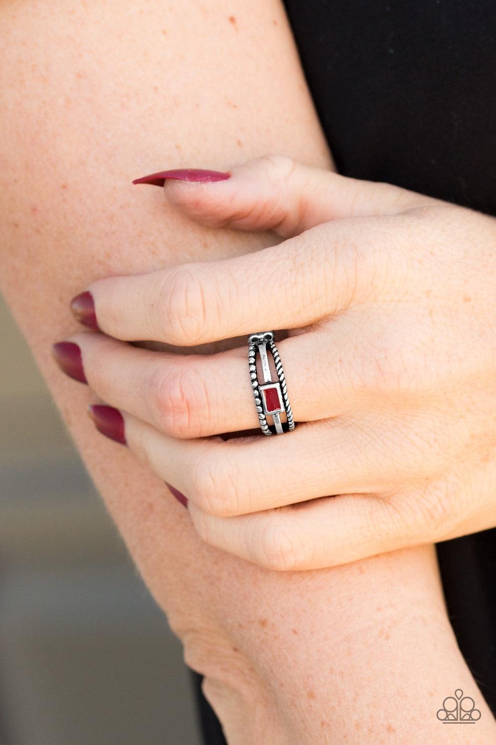 Paparazzi Accessories Street Edge - Red Featuring ropelike, smooth, and dotted textures, three glistening silver bars layer across the finger. Painted in a vivacious hue, a red frame is pressed into the centermost band for an edgy finish. Features a daint