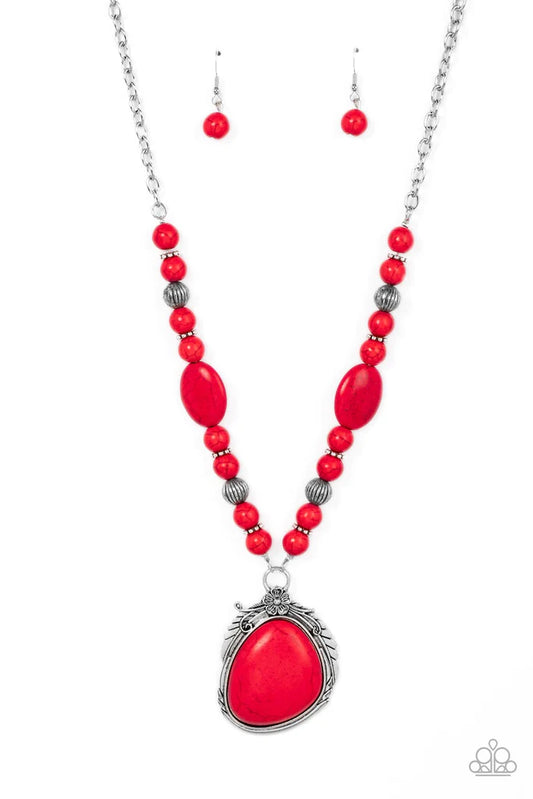 Paparazzi Accessories Southwest Paradise - Red A lengthened silver chain flows into a succession of polished red stone beads and silver accents. The flowy display gives way to an opulent red stone that is pressed into an ornate silver frame. Adorned with