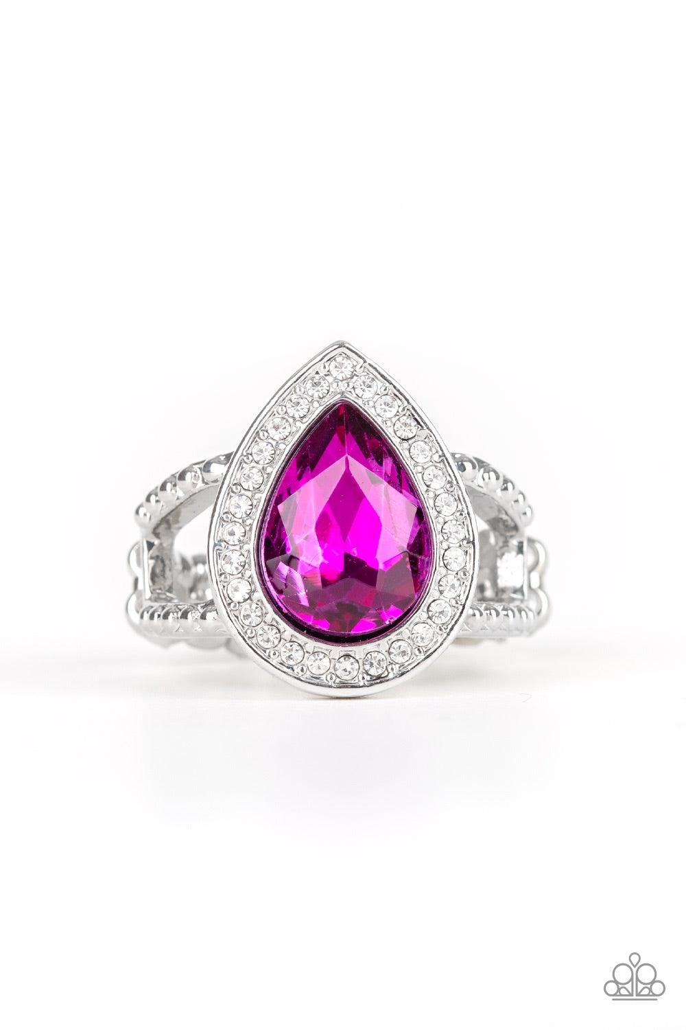 Paparazzi Accessories Hollywood Heirloom - Pink A glassy pink teardrop gem is pressed into a glistening silver frame encrusted in dainty white rhinestones, creating a glamorous frame atop the finger. Features a dainty stretchy band for a flexible fit. Jew