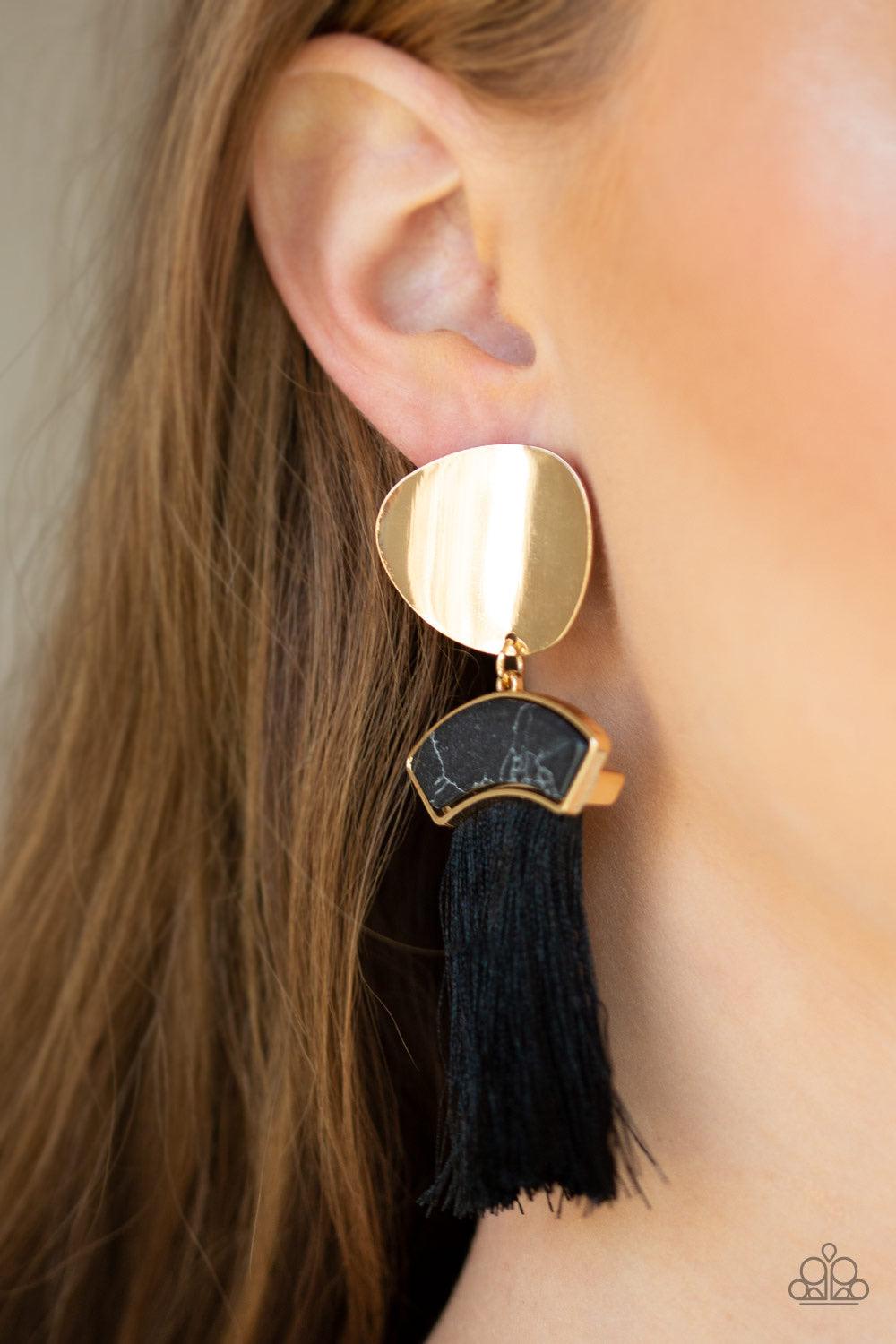Paparazzi Accessories Insta Inca - Gold A plume of shiny black thread streams from the bottom of a black stone frame that links with an asymmetrical gold disc, creating a flirtatious tassel. Earring attaches to a standard post fitting. Jewelry