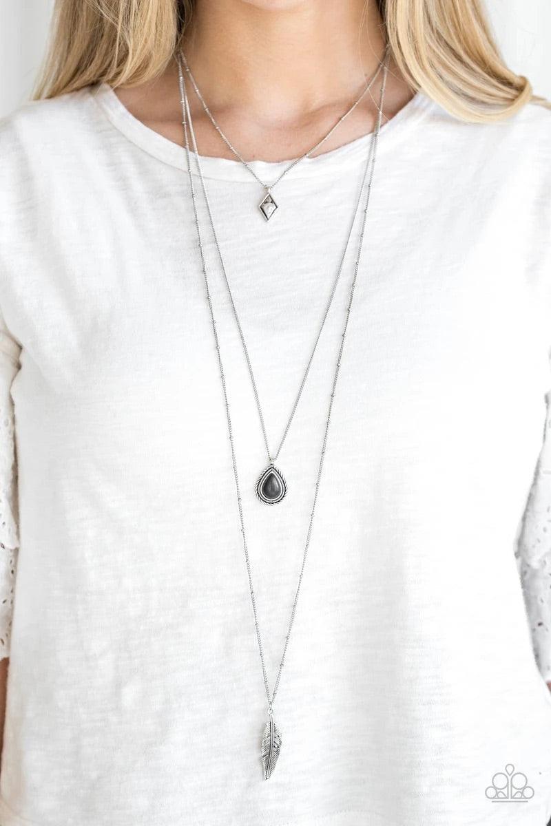 Paparazzi Accessories Fly The Coop - Black A dainty diamond shaped frame, black stone teardrop, and life-like silver feather charms layer down the chest for a seasonal look. Features an adjustable clasp closure. Sold as one individual necklace. Includes o