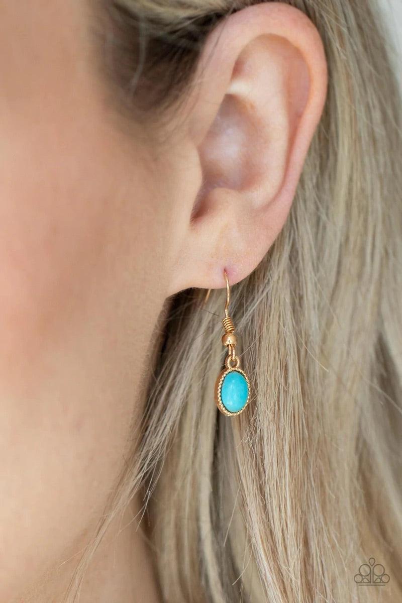 Paparazzi Accessories Sahara Safari - Blue Encased in studded gold frames, two rows of oval turquoise stones delicately connect below the collar for a seasonal flair. Features an adjustable clasp closure. Sold as one individual necklace. Includes one pair