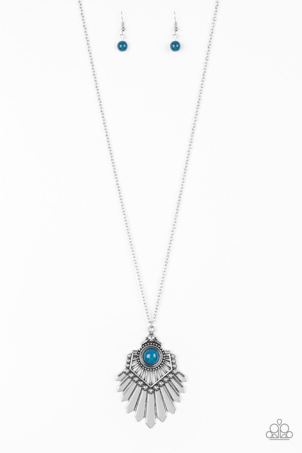 Paparazzi Accessories Inde-PENDANT Idol - Blue Infused with a lengthened silver chain, a polished blue bead is pressed into the center of a flared silver pendant for a bold tribal flair. Features an adjustable clasp closure. Sold as one individual necklac