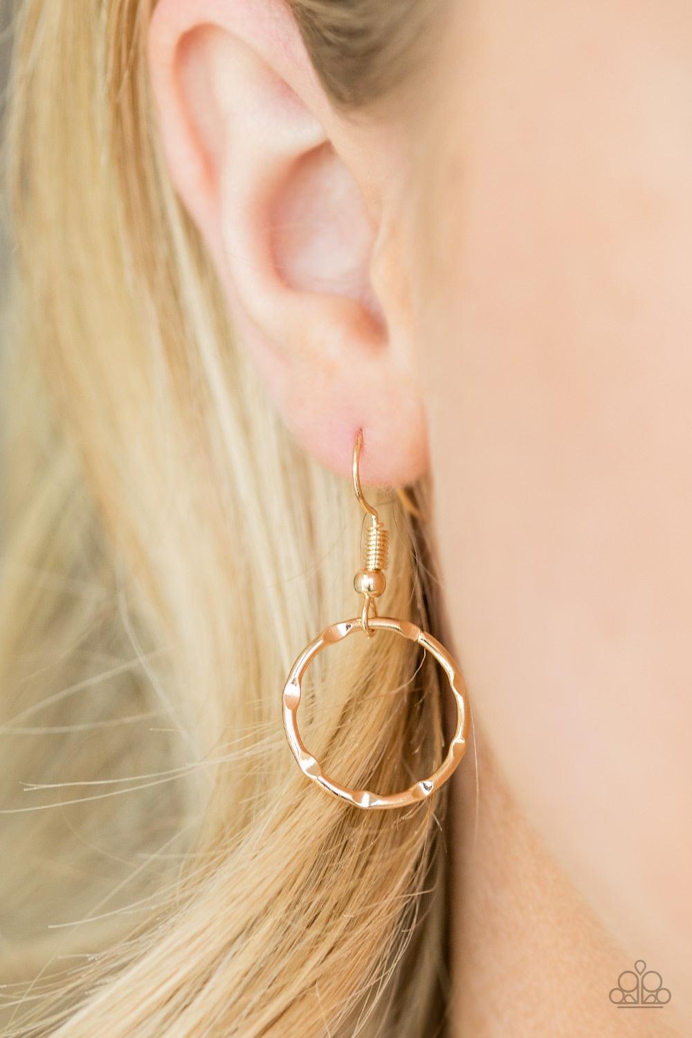 Paparazzi Accessories Urban Center - Gold Mismatched gold hoops and rings link into two shimmery rows below the collar for a bold industrial look. Features an adjustable clasp closure. Jewelry