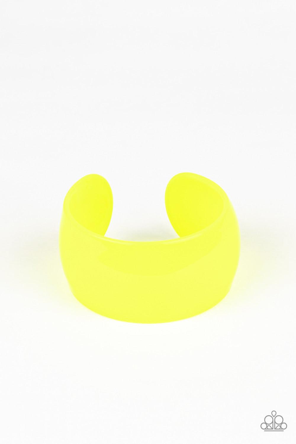 Paparazzi Accessories Fluent in Flamboyance - Yellow A neon yellow acrylic cuff curls around the wrist for a colorfully retro look. Jewelry