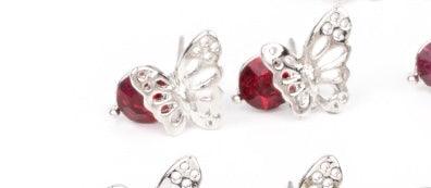 Paparazzi Accessories Starlet Shimmer Earrings #21 - Red Airy silver butterfly frames featuring glittery rhinestones vary in shades of green, yellow purple, pink, white, blue, red, purple, and multicolored. Earrings attach to standard post fittings. Jewel