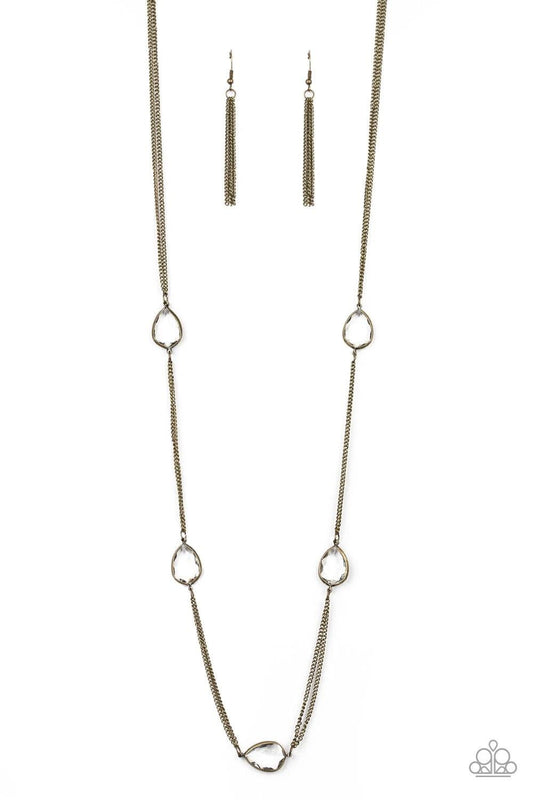 Paparazzi Accessories Teardrop Timelessness - Brass Glassy white teardrops attach to sections of antiqued brass chain across the chest, creating a refined display. Features an adjustable clasp closure. Jewelry