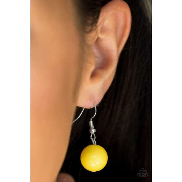Paparazzi Accessories South Shore Sensation - Yellow Dramatic silver, sunny yellow, and faceted cloudy beads are threaded along an invisible wire below the collar for a seasonal look. Features an adjustable clasp closure. Jewelry