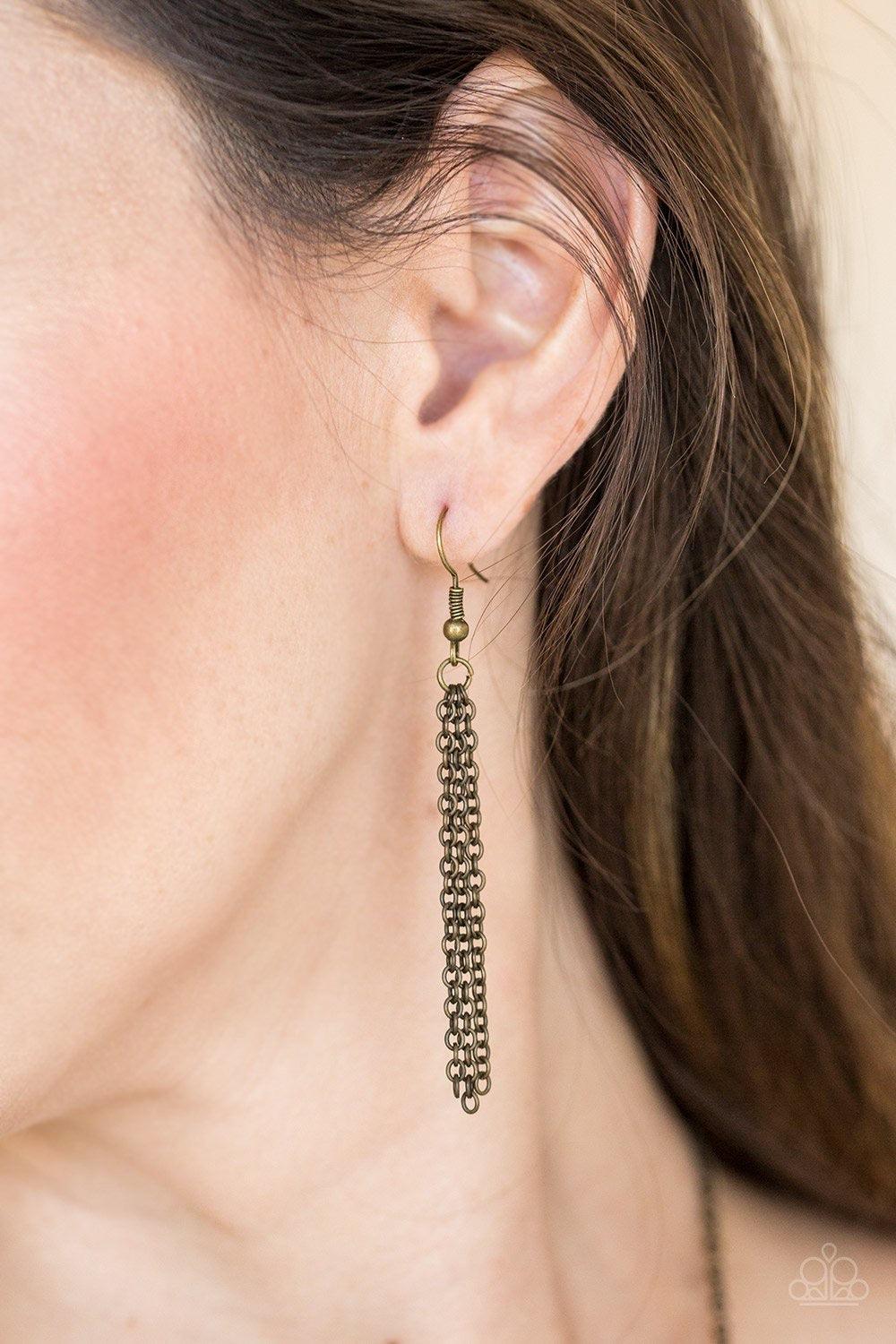 Paparazzi Accessories Ancient Arrow - Brass Stamped and studded in indigenous inspired textures, a stacked triangular pendant swings from the bottom of an elongated brass chain for a trendy tribal look. Features an adjustable clasp closure. Jewelry