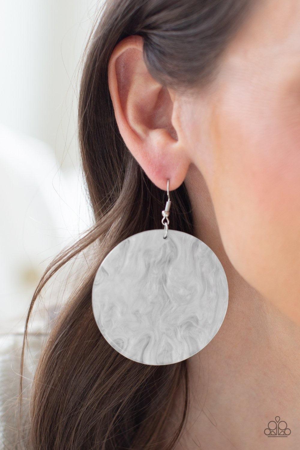 Paparazzi Accessories SEA Where It Goes - White Brushed in a shell-like iridescence, a shimmering white disc swings from the ear for a retro look. Earring attaches to a standard fishhook fitting. Jewelry