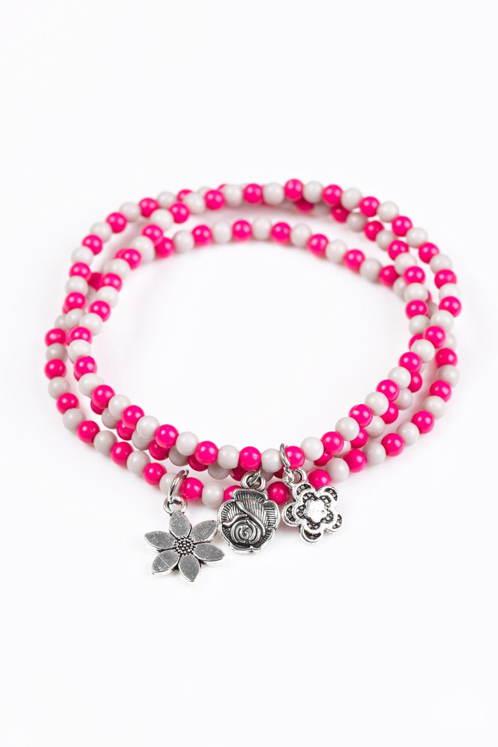 Paparazzi Accessories Rooftop Gardens - Pink Dainty pink and gray beads are threaded along stretchy elastic bands, creating colorful layers across the wrist. Brushed in an antiqued shimmer, dainty floral charms swing from the wrist for a seasonal finish.