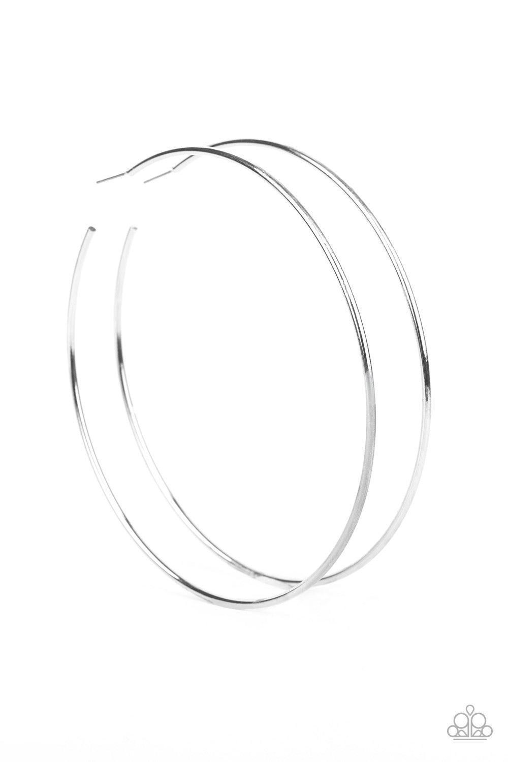 Paparazzi Accessories Extra Extra - Silver A glistening silver bar curls into a dramatically oversized hoop for a statement-making look. Earring attaches to a standard post fitting. Hoop measures approximately 4" in diameter. Jewelry