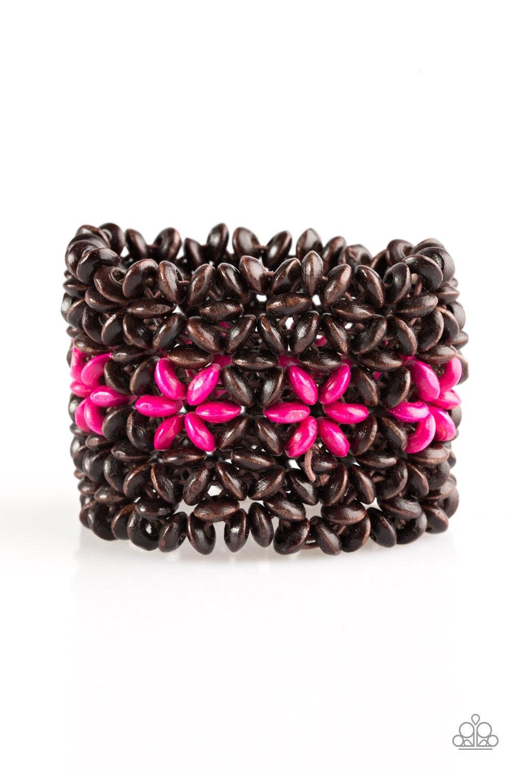 Paparazzi Accessories Bahama Babe - Pink Earthy wooden accents are threaded along elastic stretchy bands, creating an ornate bracelet. Tinted in a vivacious finish, pink wooden beads gather down the center, creating summery floral accents for a colorful f