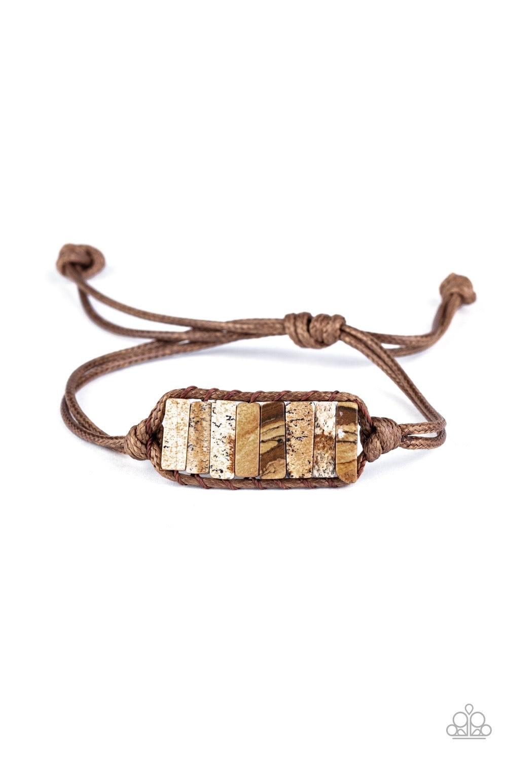 Paparazzi Accessories Canyon Warrior - Brown Chiseled into tranquil rectangular shapes, a colorful row of natural stones are knotted in place around the wrist with a piece of brown cording for an earthy look. As the stone elements in this piece are natura